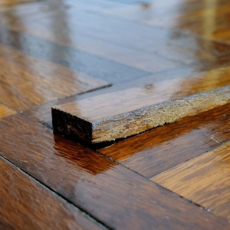 Loose wooden floorboards creaking underfoot, a common issue requiring floor repair and replacement in humid Florida homes